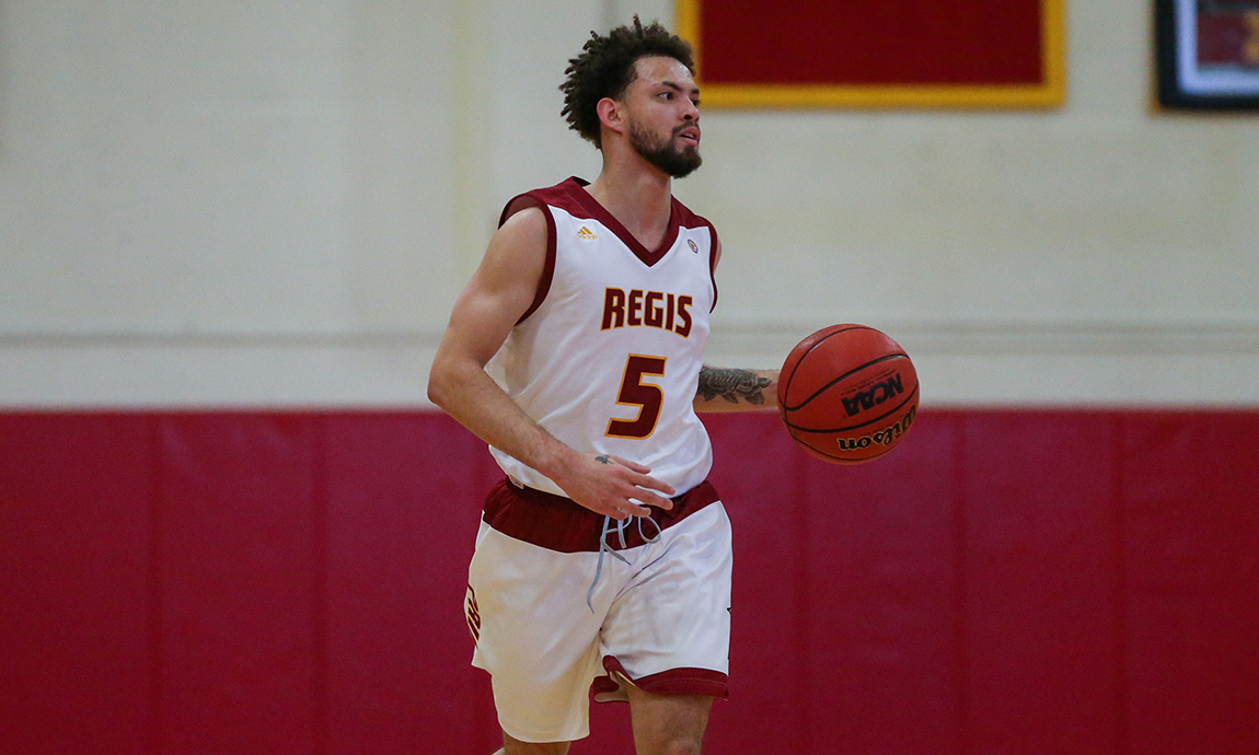Regis Men’s Hoop Loses to Trinity in Holiday Tourney
