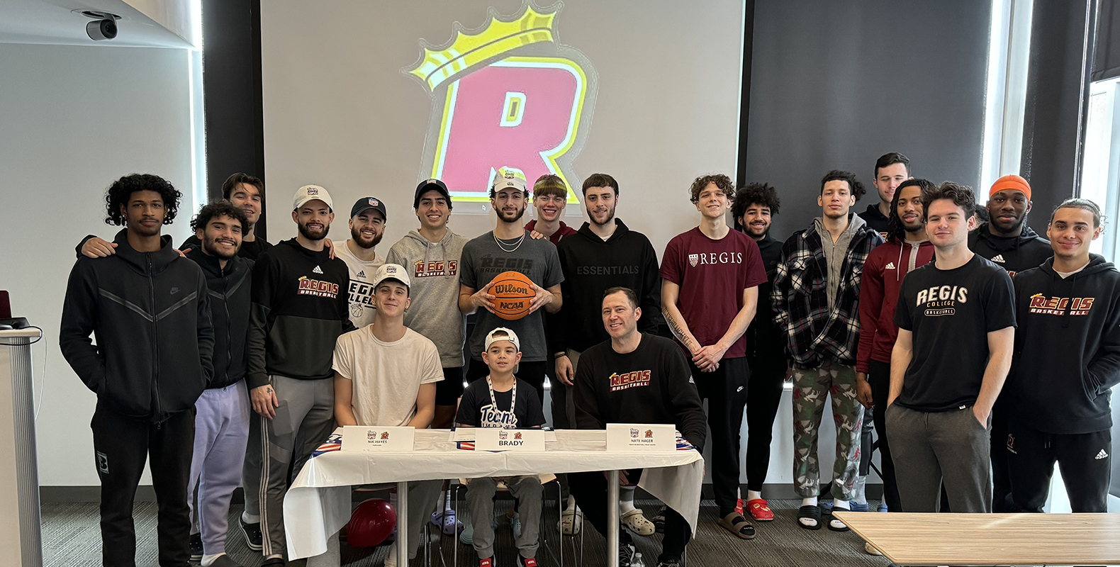 Regis College Men’s Hoop Signs Brady Quatromini Through Team Impact