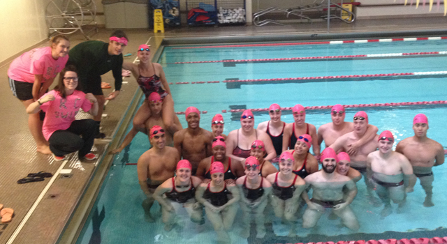 Regis wore pink swim caps to raise awareness for Breast Cancer