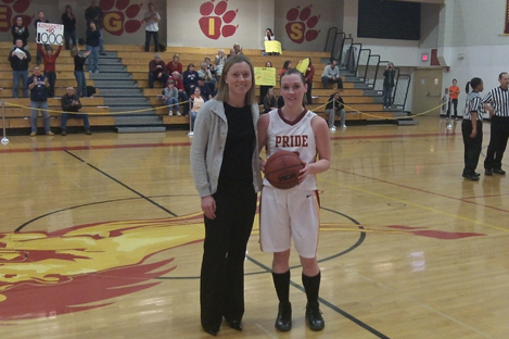 CRAWFORD NETS 1,000TH POINT IN REGIS VICTORY