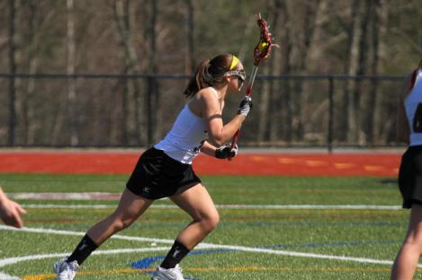 POLITIS SCORES EIGHT IN VICTORY OVER WILDCATS, 20-4